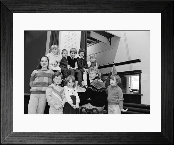 Framed Print : Almondbury Methodist Junior Church Christmas Party, singing carols round the piano Framed Print : Almondbury Methodist Junior Church Christmas Party, singing carols round the piano