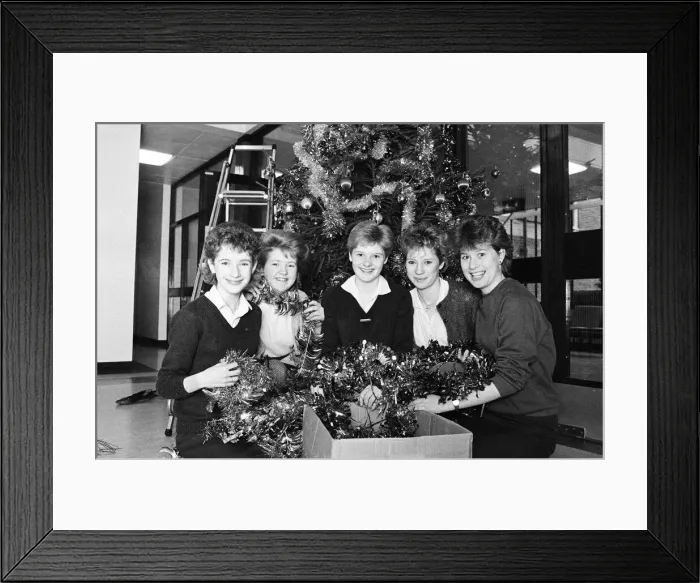 Framed Print : Rawthorpe High School pupils decorating the Christmas Tree in the entrance to St Luke Framed Print : Rawthorpe High School pupils decorating the Christmas Tree in the entrance to St Luke
