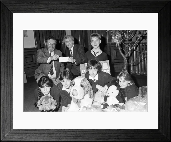 Framed Print : Royds Hall High School head Peter Clarkson presenting 40 cheque to NSPCC for their Framed Print : Royds Hall High School head Peter Clarkson presenting 40 cheque to NSPCC for their