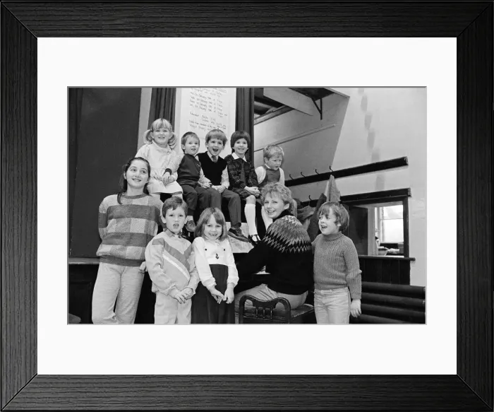 Framed Print : Almondbury Methodist Junior Church Christmas Party, singing carols round the piano