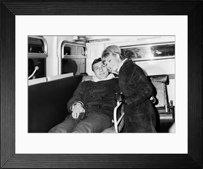 Framed Print : Charlton Athletic footballer Mike Bailey returns to London with his wife after breaking