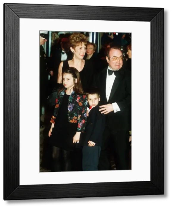 Framed Print : Bob Hoskins Film / Actor with his wife and children at the Premier of Hook Dbase MSI Framed Print : Bob Hoskins Film / Actor with his wife and children at the Premier of Hook Dbase MSI