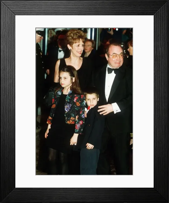 Framed Print : Bob Hoskins Film / Actor with his wife and children at the Premier of Hook Dbase MSI Framed Print : Bob Hoskins Film / Actor with his wife and children at the Premier of Hook Dbase MSI