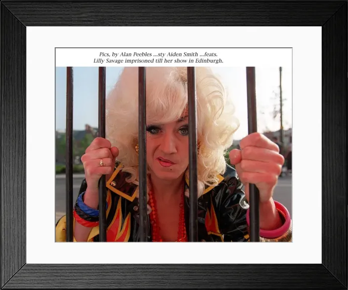 Framed Print : Lily Savage imprisoned behind iron bars till her show in Edinburgh Framed Print : Lily Savage imprisoned behind iron bars till her show in Edinburgh