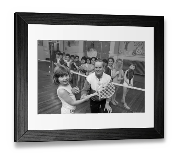 Framed Print : Pupils from Birkby Infant School, learn short tennis from Karen McLoughlin