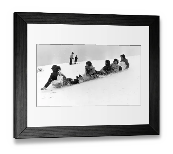 Framed Print : Children sledging, Ormesby Bank, Middlesbrough, North Yorkshire. 12th February 1978