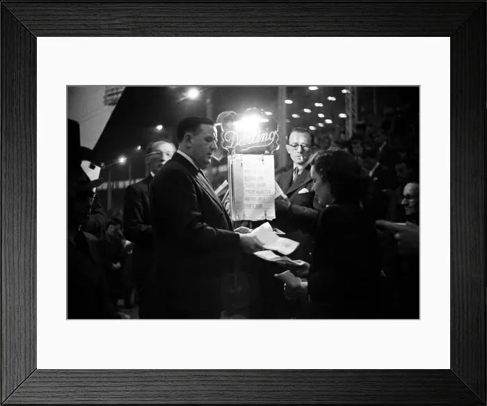 Framed Print : A night at the dogs, general views of the track and characters that work at the Greyhound