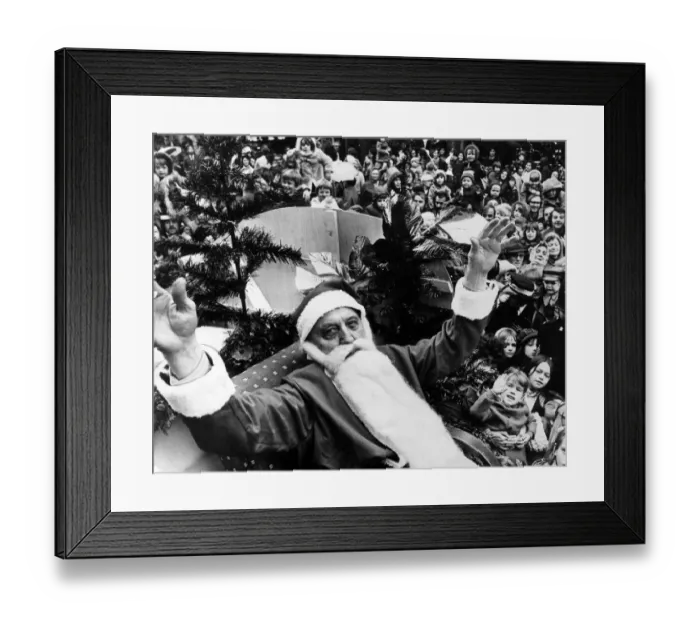 Framed Print : Father Christmas arrives in Swansea, welcomed by hundreds of city shoppers Framed Print : Father Christmas arrives in Swansea, welcomed by hundreds of city shoppers