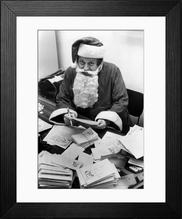 Framed Print : Santa Claus, sorting letters at Guildhall, Swansea, Wales, 13th December 1985 Framed Print : Santa Claus, sorting letters at Guildhall, Swansea, Wales, 13th December 1985