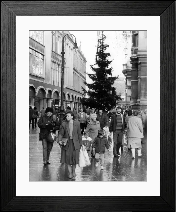Framed Print : Christmas shoppers, out in Cardiff, Wales, 13th December 1986. Near Central Library Framed Print : Christmas shoppers, out in Cardiff, Wales, 13th December 1986. Near Central Library