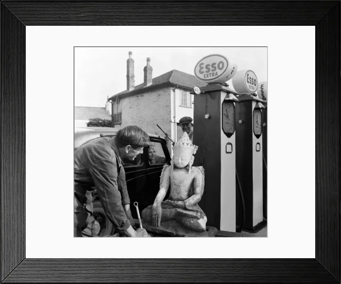 Framed Print : An eastern goddess sits in a garage in the village that wants to get rid of her