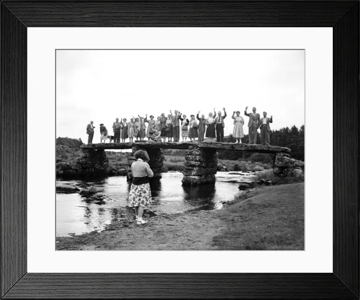 Framed Print : Holidaymakers on a Clapper Bridge (a bridge built of solid granite by ancient Britons
