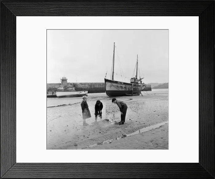 Framed Print : Young boys on the beach in St Ives lighting a fire in the sand, Cornwall Framed Print : Young boys on the beach in St Ives lighting a fire in the sand, Cornwall