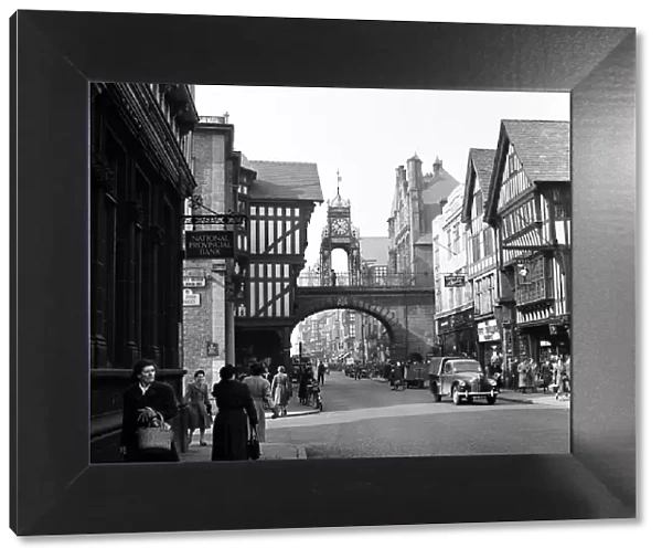 Street scenes in Chester with a view of the Eastgate and Eastgate Clock, Cheshire