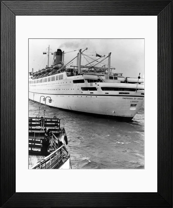 Framed Print : A Scottish piper pipes a send-off for the Canadian Pacific liner Empress of England Framed Print : A Scottish piper pipes a send-off for the Canadian Pacific liner Empress of England