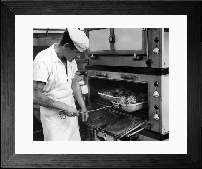 Framed Print : RAF Brawdy, Pembrokeshire, Wales. 14th July 1962. Cook J Green checks on the roast lamb Framed Print : RAF Brawdy, Pembrokeshire, Wales. 14th July 1962. Cook J Green checks on the roast lamb