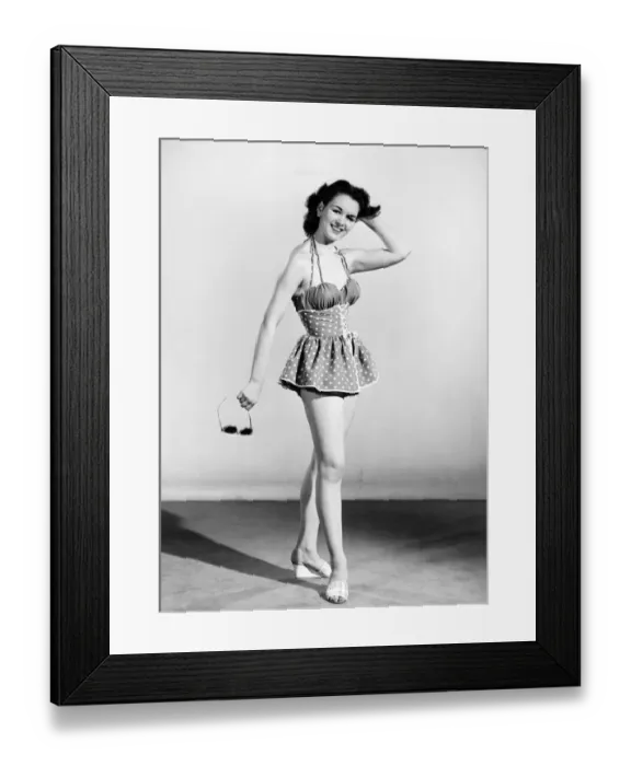 Framed Print : Woman wearing swimming costume. 1955