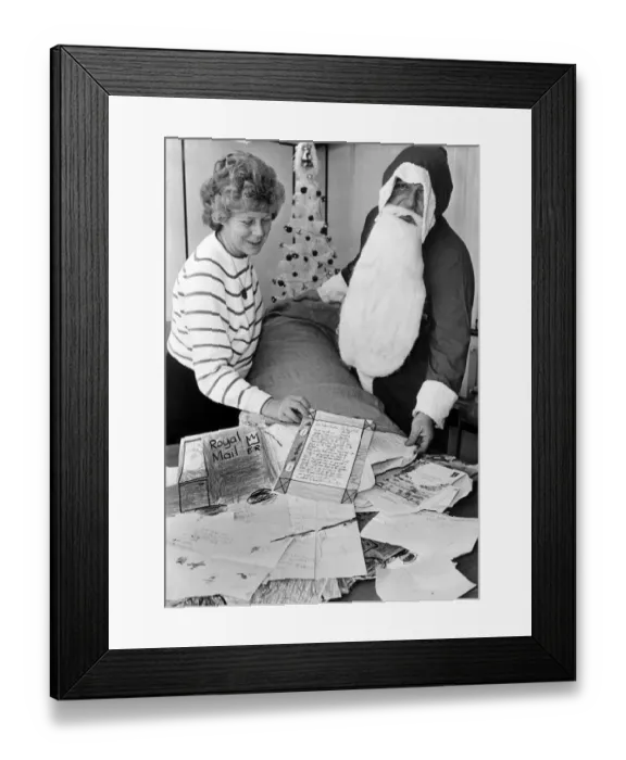 Framed Print : Father Christmass helpers are working flat out at the Post Office replying to more