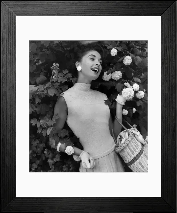 Framed Print : A woman modelling Knitwear. July 1956 Framed Print : A woman modelling Knitwear. July 1956