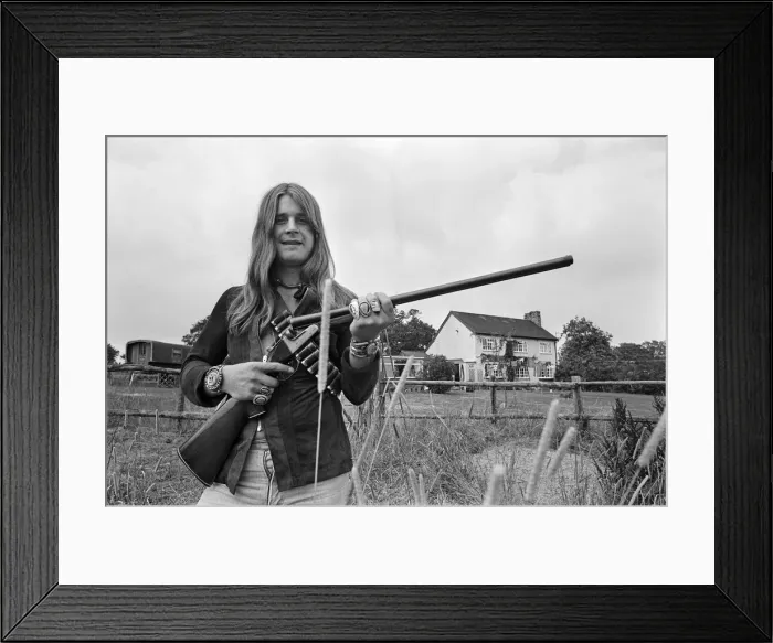 Framed Print : Black Sabbath lead singer Ozzy Osbourne out with his shotgun at his Staffordshire home Framed Print : Black Sabbath lead singer Ozzy Osbourne out with his shotgun at his Staffordshire home