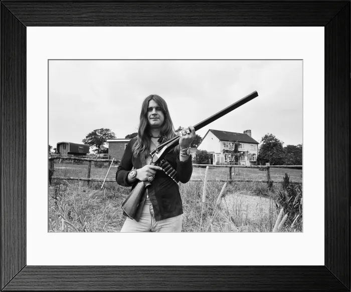 Framed Print : Black Sabbath lead singer Ozzy Osbourne out with his shotgun at his Staffordshire home Framed Print : Black Sabbath lead singer Ozzy Osbourne out with his shotgun at his Staffordshire home