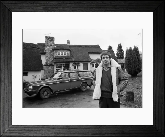 Framed Print : Black Sabbath singer Ozzy Osbourne pictured outside his new house, beside his Volvo car Framed Print : Black Sabbath singer Ozzy Osbourne pictured outside his new house, beside his Volvo car