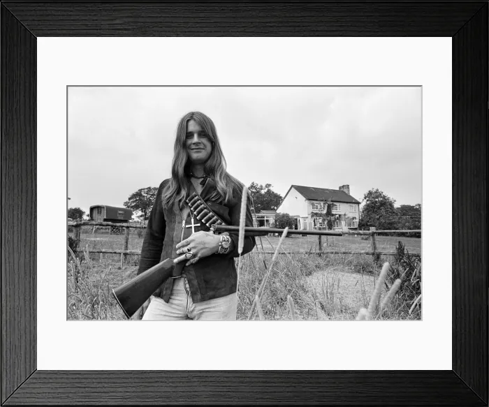 Framed Print : Black Sabbath lead singer Ozzy Osbourne out with his shotgun at his Staffordshire home Framed Print : Black Sabbath lead singer Ozzy Osbourne out with his shotgun at his Staffordshire home