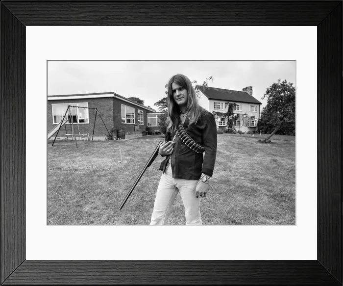 Framed Print : Black Sabbath lead singer Ozzy Osbourne out with his shotgun at his Staffordshire home