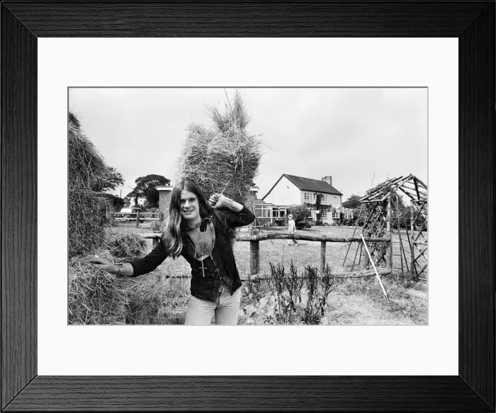 Framed Print : Black Sabbath lead singer Ozzy Osbourne out with his shotgun
