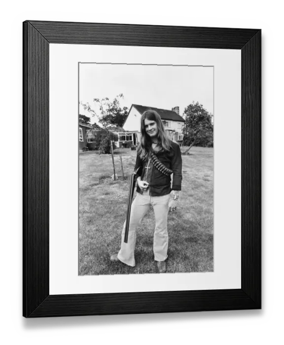 Framed Print : Black Sabbath lead singer Ozzy Osbourne out with his shotgun at his Staffordshire home Framed Print : Black Sabbath lead singer Ozzy Osbourne out with his shotgun at his Staffordshire home