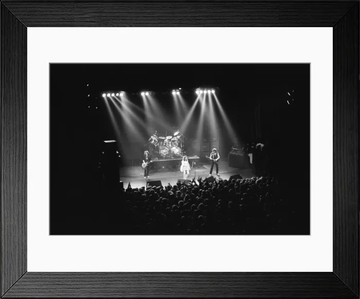 Framed Print : Black Sabbath rock group in concert during their Heaven and Hell tour Framed Print : Black Sabbath rock group in concert during their Heaven and Hell tour