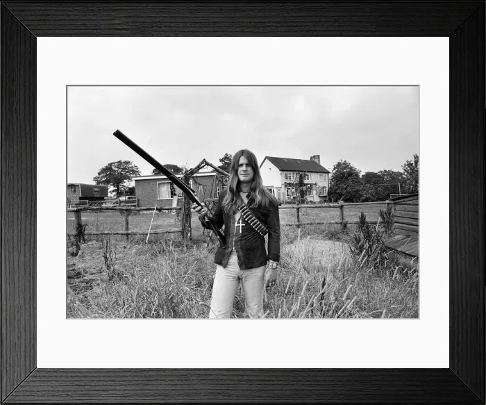 Framed Print : Black Sabbath lead singer Ozzy Osbourne out with his shotgun at his Staffordshire home