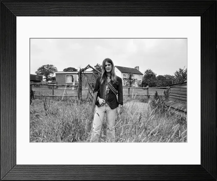 Framed Print : Black Sabbath lead singer Ozzy Osbourne out with his shotgun at his Staffordshire home
