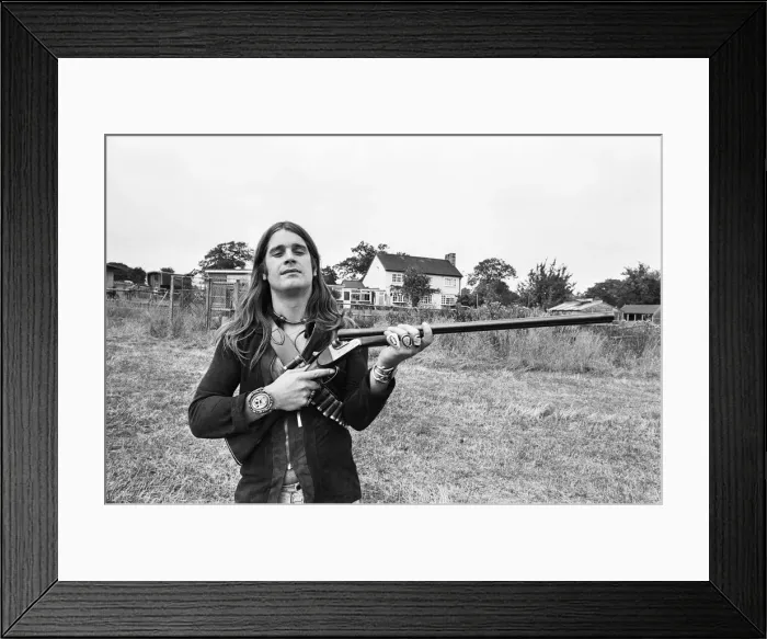 Framed Print : Black Sabbath lead singer Ozzy Osbourne out with his shotgun at his Staffordshire home Framed Print : Black Sabbath lead singer Ozzy Osbourne out with his shotgun at his Staffordshire home