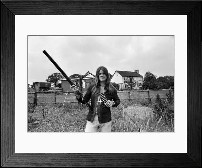 Framed Print : Black Sabbath lead singer Ozzy Osbourne out with his shotgun at his Staffordshire home Framed Print : Black Sabbath lead singer Ozzy Osbourne out with his shotgun at his Staffordshire home
