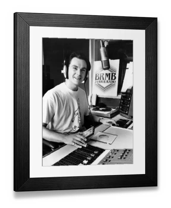Framed Print : BRMB Disc Jockey Graham Torrington, who is sitting in for Breakfast Show host Les Ross
