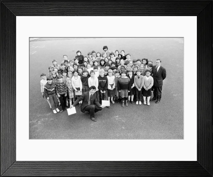 Framed Print : County Councillor John Harman presents West Yorkshire cycling proficiency awards to 68