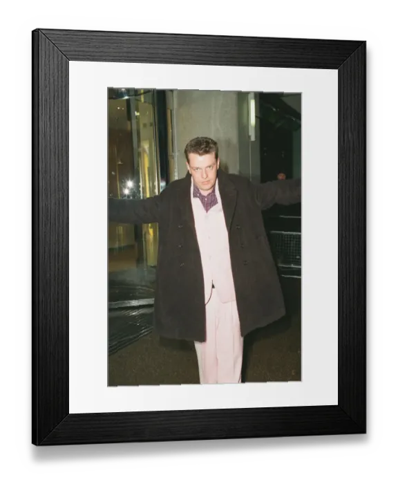 Framed Print : Suggs, lead singer of British ska group Madness, arrives for the British Comedy Awards