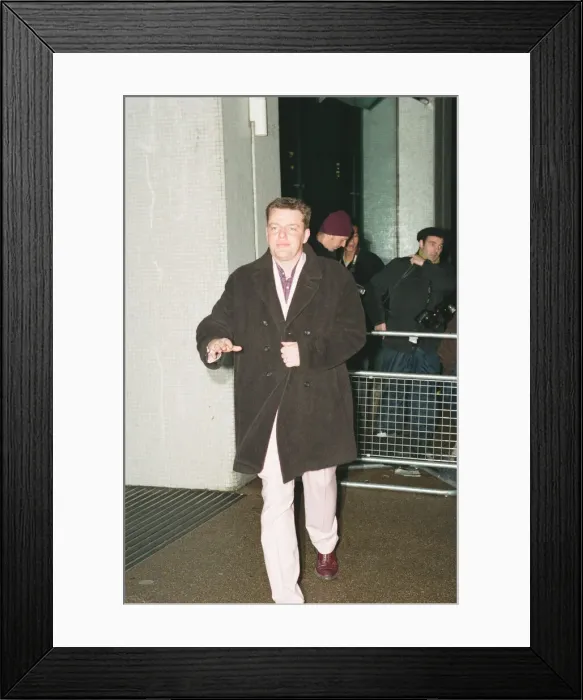 Framed Print : Suggs, lead singer of British ska group Madness, arrives for the British Comedy Awards Framed Print : Suggs, lead singer of British ska group Madness, arrives for the British Comedy Awards