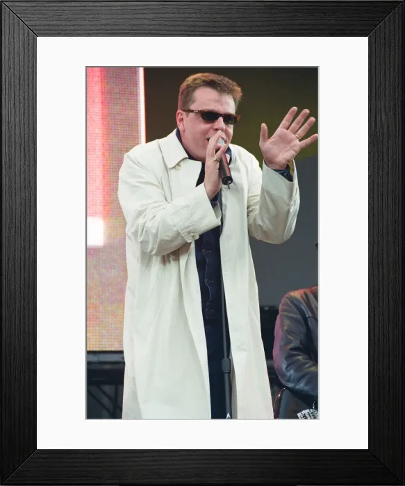 Framed Print : Suggs, lead singer of British ska group Madness, performing at Party in the Park at Hyde Framed Print : Suggs, lead singer of British ska group Madness, performing at Party in the Park at Hyde