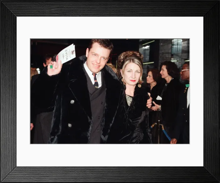 Framed Print : Suggs, lead singer of British ska group Madness, arrives for the Evita film premiere in