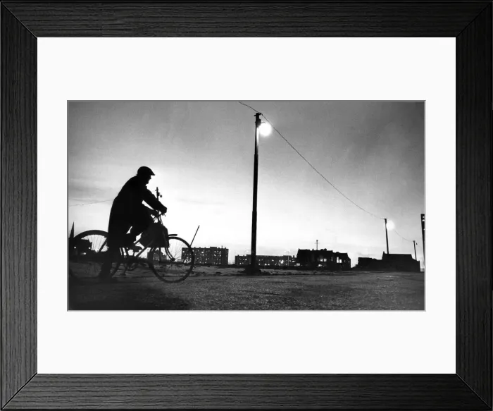 Framed Print : A cyclist taking a break as he rides through wasteland in Everton Framed Print : A cyclist taking a break as he rides through wasteland in Everton