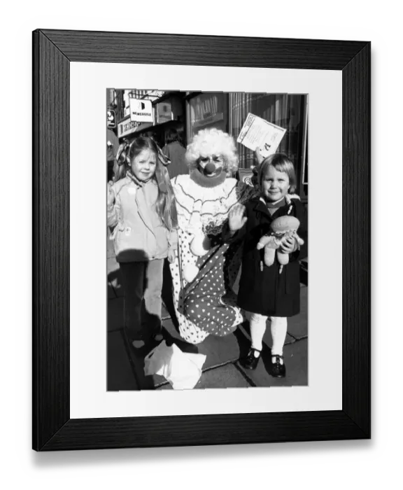 Framed Print : Clown Muriel Jessop, of Marske Kiddigrams, is helped out at Yarm by Rebecca Ford (left Framed Print : Clown Muriel Jessop, of Marske Kiddigrams, is helped out at Yarm by Rebecca Ford (left