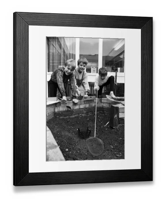 Framed Print : Golcar Junior School pupils are pictured by the pond that they have been working on since Framed Print : Golcar Junior School pupils are pictured by the pond that they have been working on since
