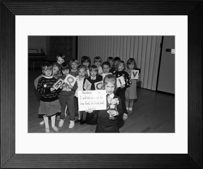 Framed Print : Four year old Kirsten Hurdus is the youngest member of the Rainbow Guides group which has