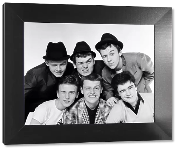 Pop group Madness pose in the Daily Mirror Studio, minus member Lee Thompson