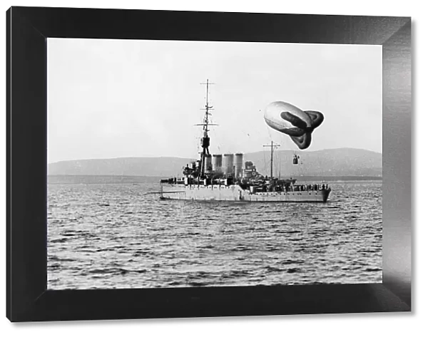 A Royal Navy light cruiser seen here operating a observation balloon given the nickname