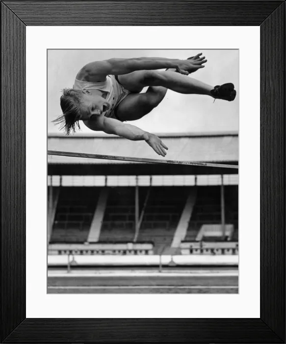 Framed Print : Geoff Elliot seen here competing and winning the high jump at the universities athletic Framed Print : Geoff Elliot seen here competing and winning the high jump at the universities athletic
