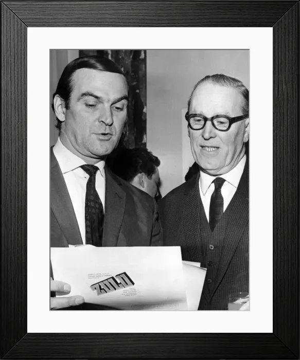 Framed Print : Stanley Baker chats with Mr. Julian Hodge at the reception at the Park Hotel, Cardiff