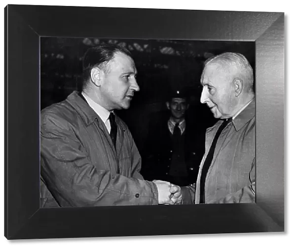 Aston Villa coach Jimmy Hogan shaking hands with manager Eric Houghton